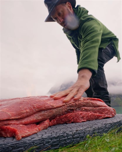 A suitcase of pure fire and flavor. 🔥🥩 Stacked layer by layer, wrapped in bold black gin marinade, and tied together like a masterpiece ready for some fire. #MeatSuitcase #FireKitchen #Flame | Fire Kitchen