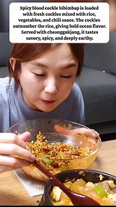 Spicy blood cockle bibimbap is loaded with fresh cockles mixed with rice, vegetables, and chili sauce. The cockles outnumber the rice, giving bold ocean flavor. Served with cheonggukjang, it tastes savory, spicy, and deeply earthy#hamzy #fblifestyle #reel Bagian 7 | Hamzy Fans, mukbang ASMR