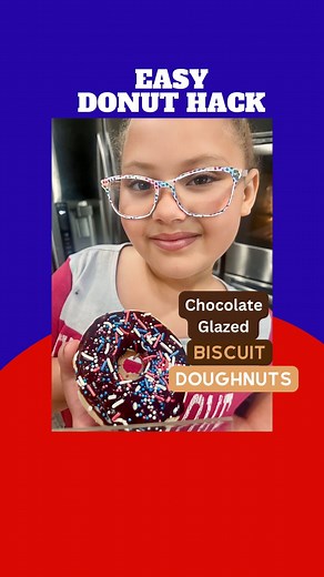 Chocolate Glazed Biscuit Doughnut Recipe 🍩 Easy Donut Hack You Will Love👇🏾👇🏾 Great for July 4th 🇺🇸 Breakfast Recipe is for 8 Doughnuts 🍩 Ingredients : 1 can biscuits 1/2 cups of semi-sweet chocolate chips 2 tablespoons of butter 2 teaspoons of light corn syrup (to make them shiny) 2 teaspoons of water. Make Biscuit Doughnut 🍩 Pop open a can of biscuits. Punch holes in the middle either with a circle cookie cutter or you can make the hole with your fingers like we did this time Put on pa
