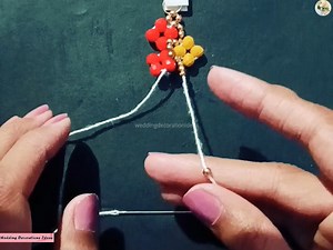 8K views · 138 reactions | How to Make Beautiful Red and Yellow Flower Bracelet | Wedding Decoration Ideas | Facebook