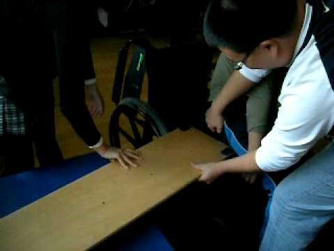 one- person dependent sliding board transfer