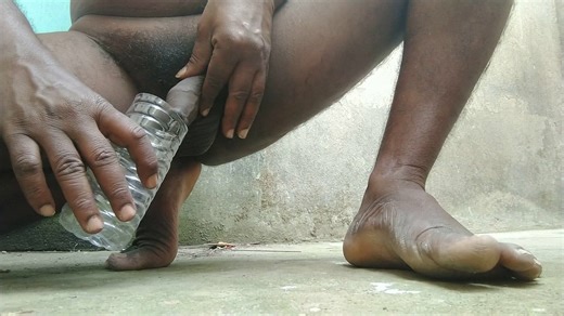 Pee show – urine filling the bottle