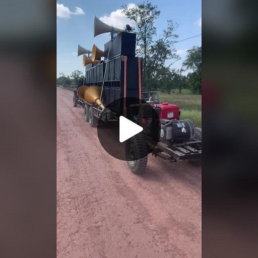 Large Speaker Trailer with Horns on a Tractor