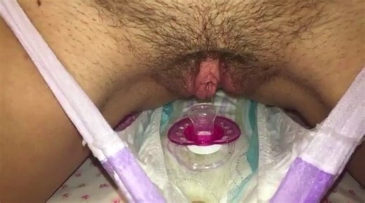 GIRL PEES ON DUMMY IN OPEN GOODNITES