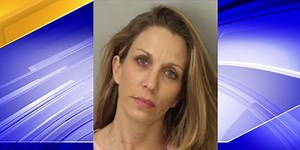 Woman arrested, charged with impersonating a bail bond agent