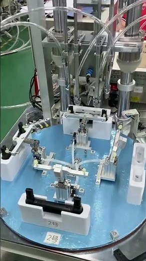 Rotary screwing machine with multi station and screwdriver head for luggage handle screw fastening