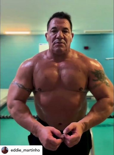 Big beefy muscle bull daddy Eddie Martinho showing off his amazing progres