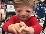 Adorable moment boy learns to say 'I love you' in sign language