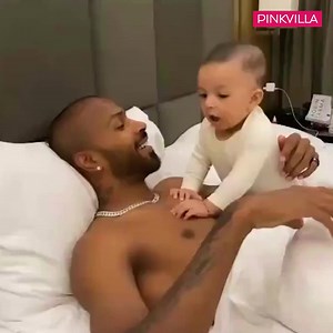 402K views · 10K reactions | Papa Hardik Pandya never misses a chance to cuddle his little boy! Watch Pandya and JR.Pandya aka Agastya have some father-son time. ❤️❤️ Don’t miss Hardik shirtless and flaunting his tattoos  | PinkVilla | Facebook