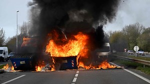 Travel warning after protests spark chaos in France as riots block motorway