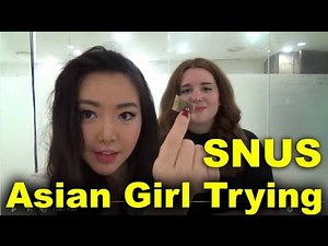 Asian girl trying Snus