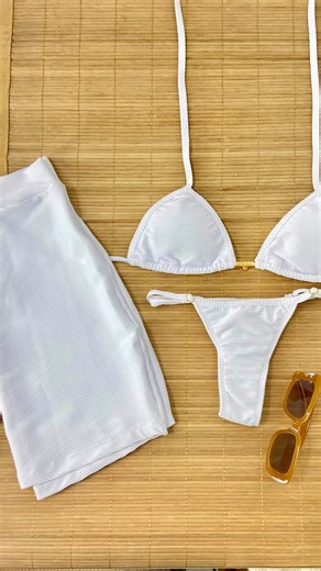 Biquínis Camila Alves | Moda Praia Crochê e Fitness | O look perfeito para arrasar nesse verão! 😱🤩 • Top Cortininha e Tanga Regulador Fio Dental Branco Texturizado • Saia Curta Básica Branco... | Instagram