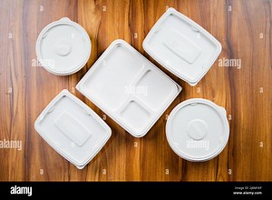 Stop motion video of placing packaged food boxes on table - concept of biodegradable or eco friendly plastic free food packing Stock Photo - Alamy
