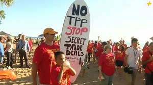 Hundreds of activists crash the Trans-Pacific Partnership talks in Hawaii. Why? | AJ