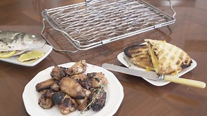 The Flexible Grill Basket is perfect for fish, vegetables, sandwiches & even wings! 🔥 | Napoleon