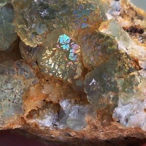 Goethite(?) on fluorite with quartz on matrix.. collected in Los Angeles county in December. I only found a small handful of specimens exhibiting this gorgeous rainbow sheen | Marble Tulip Minerals & Lapidary | Facebook