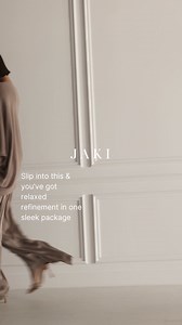 194K views · 479 reactions | Our iconic Asymmetric knit is unbelievably flattering. Wear it as a cosy cowl neck, or off the shoulder for instant impact. Style with a matching satin jumpsuit for an effortlessly put-together look. This monochromatic look elongates your silhouette, and keeps you ultra-comfortable. Adjust the straps of the jumpsuit to find your custom fit. Shop JAKI. | JAKI London | Facebook