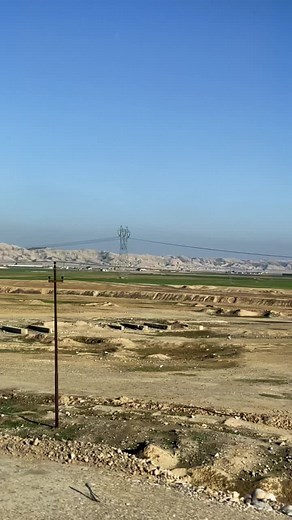 Serene Rural Landscapes: Open Fields and Mountains