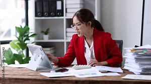 Business Employee Asian woman hand working in Stacks paper files for searching and check unfinished document archives on folders papers at busy work desk workplace office. Business Documents concept.