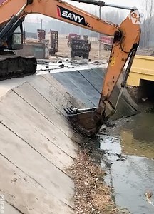 193K views · 542 reactions | Drowning puppy scooped from dirty river via excavator | Science, Tech and Universe | Facebook
