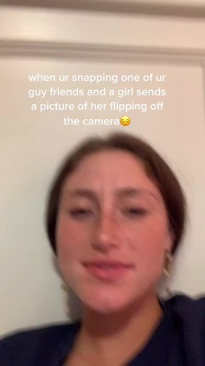 Girl Crying While Flipping off Camera