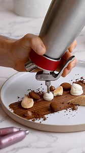 Surprise your guests with a new interpretation of the classic Tiramisù! 😍🇮🇹 This creamy mascarpone will delight your senses! 😋 Here’s the recipe for you 👇 Ingredients: - 200 g Mascarpone - 100 g Milk - 100 g Cream min. 30 % fat - 100 g QimiQ Vanilla - 50 g Sugar or Coffee Syrup Preparation: 1️⃣ Blend all ingredients finely with a hand blender or in a stand mixer. 2️⃣ Then pour the entire mixture into a 0.5 L iSi Whip. Screw on an iSi Professional Charger and shake vigorously 12-14 times. 3️