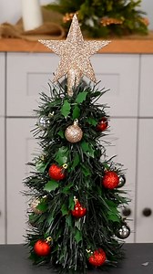 2.7K views · 11 reactions | Turn bottle into a mini Christmas tree | Cuff-Zoned | Facebook