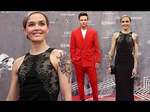 Victoria Pendleton displays her array of tattoos in sleeveless black dress as she joins Liam Payne o