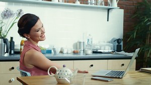 Woman saying hello on webcam | Free Stock Video Footage