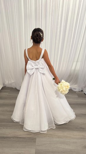 The sweetest flower girl, radiating beauty in her very own Cinderella gown. . . #flowergirlgoals #flowergirlduties #couturegown #custommade #whitebutterflybridalcouture | White Butterfly Bridal Couture