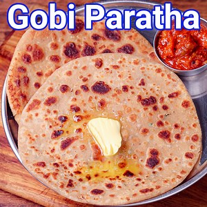 Gobi Paratha: bit.ly/2YqPjtW Palak Paneer: bit.ly/3w7N9Vx Gobi Paratha Recipe | Cauliflower Paratha | Gobi Ka Paratha with step-by-step photo and video recipe. A North Indian or Punjabi cuisine parantha stuffed with flavored grated cauliflower. The bread is prepared with whole wheat flour dough to which spiced grated gobi mixture is stuffed. Moreover, there are several recipes for gobhi parantha which mainly differ in their stuffing. #hebbarskitchen | Hebbar's Kitchen