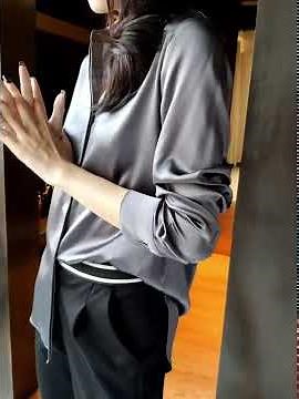 Sexy woman in gorgeous shinning Silk Satin Blouse