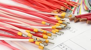 copper wires in colored insulation on the electrical diagram.Soft focus.