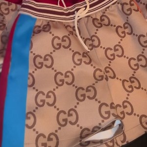 Jacket and gucci shorts