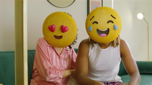 Playful Emoji-Faced Couple - Free Stock Video