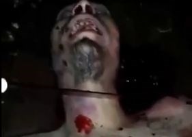 Man gets his head cut off alive.