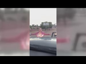 Woman flashes family after fender-bender