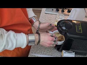 Coffee ☕ while handcuffed with gunmetal black hinged cuffs 👮‍♀️ 🔐 ⛓