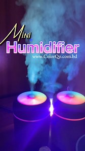 🔥Humidifier Air Purifier (জলীয়বাষ্প নিক্ষেপকারী/নির্গমনকারী যন্ত্র) 💥 🔴 হিউমিডিফায়ার বা জলীয় বাষ্প নিক্ষেপকারী/ নির্গমনকারী যন্ত্রের আকার খুব ছোট হলেও এর উপকারিতা কিন্তু মোটেও কম নয়। 🔴 এটা থেকে শুধু জলীয় বাষ্প নির্গমন করবে, সাথে White RGB লাইটও জ্বলবে । 🔴 এইটায় ব্যবহৃত পানির সাথে Perfume স্প্রে করে রুম AIR FRESHENER হিসেবেও ব্যবহার করা যায় । 🔴 এটা গ্রীষ্ম / শীত কালে ত্বকের শুস্কতা ও রুক্ষতা দূর করে ত্বকের কোমলতা বজায় রাখতে সহায়তা করে। 🔴 বদ্ধ ঘরের মধ্যেও অদৃশ্য ধুলাবালি/ রোগ জীবানু থাকে, হ