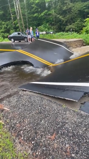 28 reactions | A road in Hillsboro, N.H., collapsed on Sunday, July 16, amid flash flood warnings. Video shows the moment rushing water forced the blacktop on Hillsboro’s East Washington Road to buckle and split. Credit: Isaac Bailey via Storyful | WeatherBug | Facebook