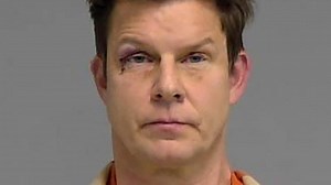 TV star unrecognisable in mugshot after arrest