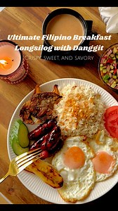 Longsilog with Danggit Recipe: Place the longganisa in a pan with a bit of water. Let it simmer until the water evaporates, then allow it to fry in its own oil until browned and caramelized. Slice ripe saba bananas and pan-fry until golden brown on both sides. Set aside. Fry your eggs sunny-side up or however you like them, crispy edges make it even better! Lightly fry danggit (dried fish) in hot oil until crispy. Be careful, it cooks quickly! Make the Garlic Fried Rice in another pan, heat oil 