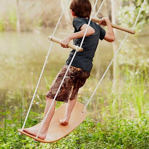 This is the swing your kids will never forget ... it even fits you. | Fatherly