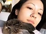 Constance Wu snuggles up to her precious bunny Lida-Rose