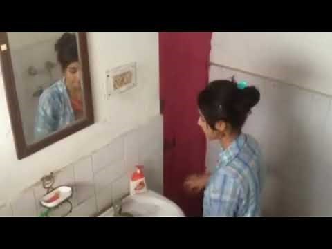 Girl changing dress in washroom | Hidden Cemera | Girl in washroom recording live video | Hot | MMS