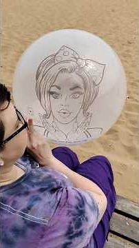 'Blow with me' on the beach!