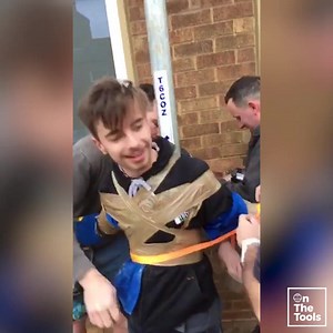 apprentice duct taped to pole