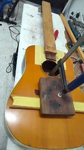 Typically made of rosewood or ebony, an acoustic guitar bridge has one long slot for the saddle as well as six holes for each string. The bridge's primary purpose is to hold the saddle and strings in place. | Nonuz Guitar Centre | Facebook