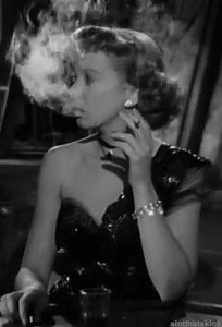 "Ida Lupino" as 'Lily Stevens' in "Road House" (1948) * #Director: Jean Negulesco * #Screenplay by Edward Chodorov * Costume Design: Kay Nelson * #Hair Stylist: Catherine Reed, Myrl Stoltz * #MakeUp: Ben Nye * Synopsis: A night club owner becomes infatuated with a torch #singer and frames his best friend/manager for embezzlement when the chanteuse falls in love with him. * Ida Lupino was paid $95,000 for her role. #IdaLupino #RichardWidmark #Art #Cinema #Smoking #Cigarette #OldHollywood #Classic