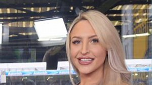 Emma Jones poses with darts trophy but fans worry about 'faith in buttons'